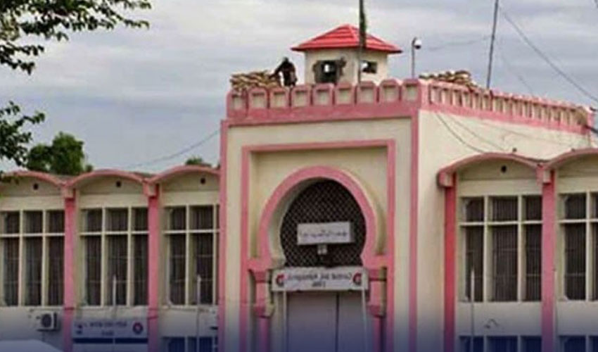 "An exterior view of Adiala Jail Rawalpindi building with security post on top"